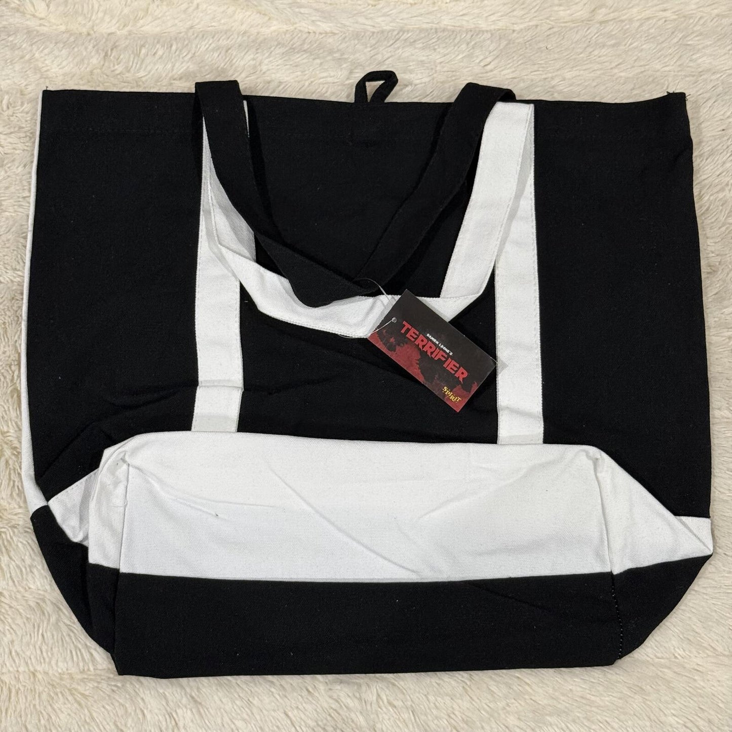 Terrifier Embroidered Tote Bag. 15.3" H x 17.5" W x 6" D.