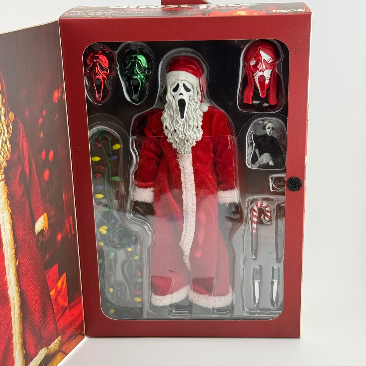 NECA - Ghost Face Santa's Slay Ultimate 7" Action Figure 2026